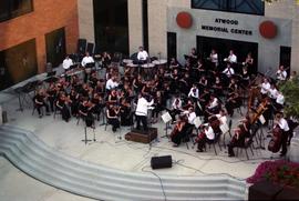 An orchestra plays, Lemonade Concert and Art Fair, St. Cloud State University