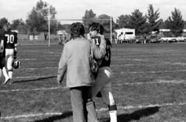 Football player Gary Morgal is greeted after a St. Cloud State University football game against Michigan Tech