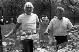 Bob Trisko and another man sell art merchandise, Lemonade Concert and Art Fair, St. Cloud State University