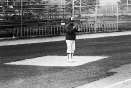 Head coach Denny Lorsung stands near third base during a St. Cloud State University baseball game