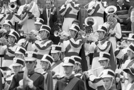 Marching band performs at a football game, St. Cloud State University