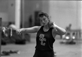 Sandra Dingmann readies to throw the shot put, St. Cloud State University