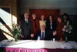 St. Cloud State employees pose with author Ray Bradbury