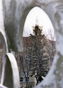 Riverview (1913) seen through the Perspectives sculpture, St. Cloud State University