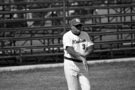 Baseball coach Jim Stanek gives signs during a baseball game, St. Cloud State University