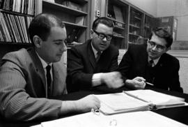 Faculty coordinator Garry Hawkins and KVSC general manager Andrew Marlow meet with another man at KVSC, St. Cloud State University