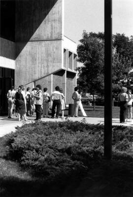 Student gather outside the Education Building, St. Cloud State University