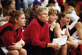 St. Cloud State women's basketball coach Lori Ulferts and others look on at the game action